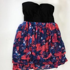 Strapless dress size small. Black top with bright multicolor skirt